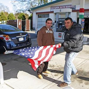 Ex Cop Charged in Flag Assault